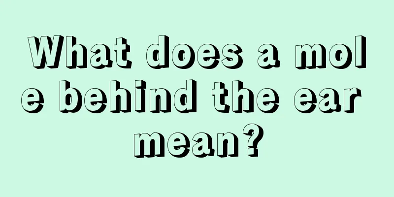 What does a mole behind the ear mean?