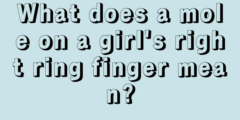 What does a mole on a girl's right ring finger mean?