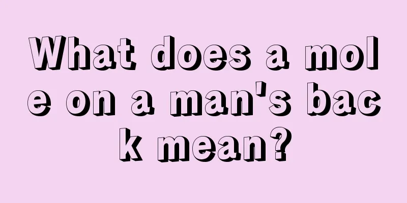 What does a mole on a man's back mean?