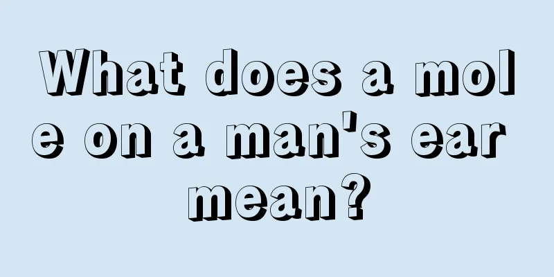 What does a mole on a man's ear mean?