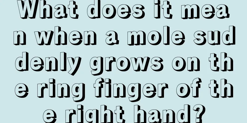 What does it mean when a mole suddenly grows on the ring finger of the right hand?