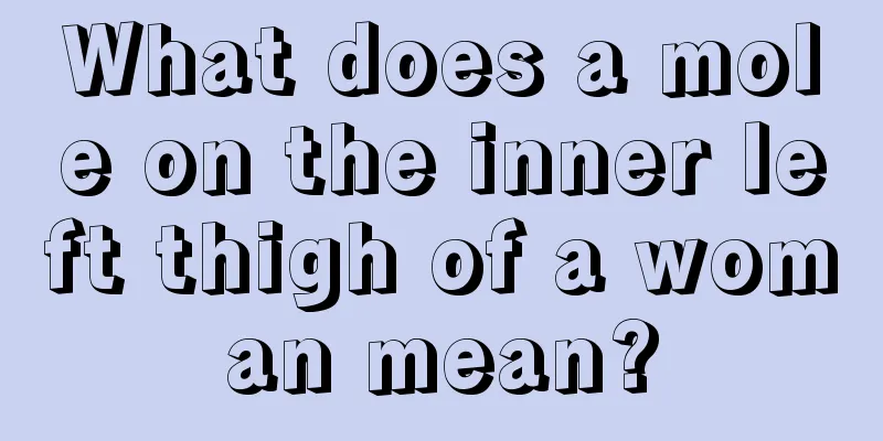 What does a mole on the inner left thigh of a woman mean?