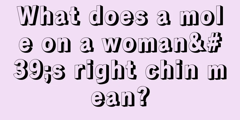 What does a mole on a woman's right chin mean?