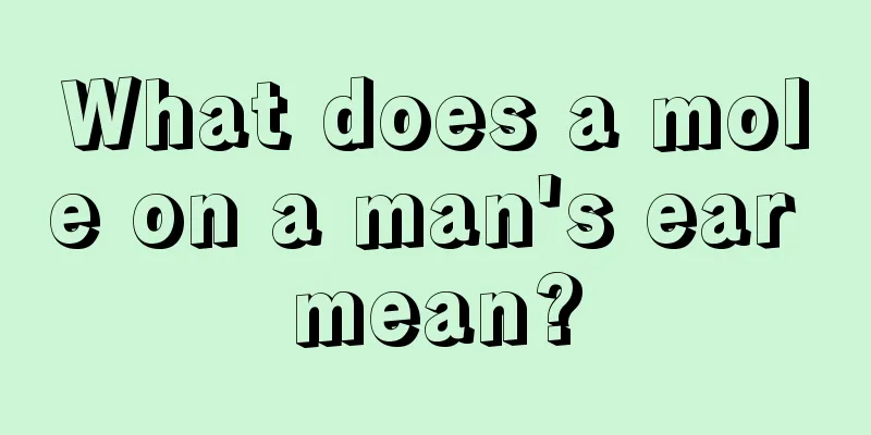 What does a mole on a man's ear mean?