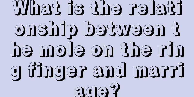What is the relationship between the mole on the ring finger and marriage?