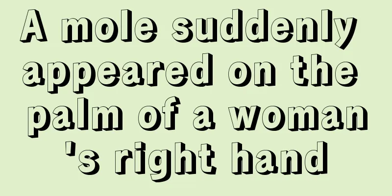 A mole suddenly appeared on the palm of a woman's right hand