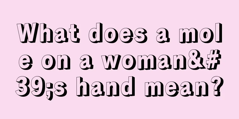 What does a mole on a woman's hand mean?