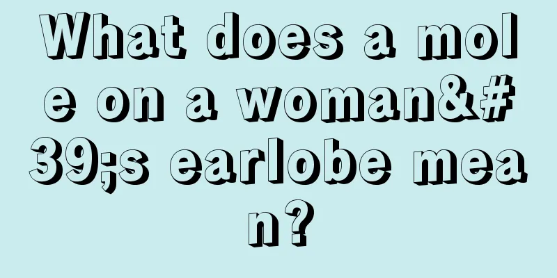 What does a mole on a woman's earlobe mean?