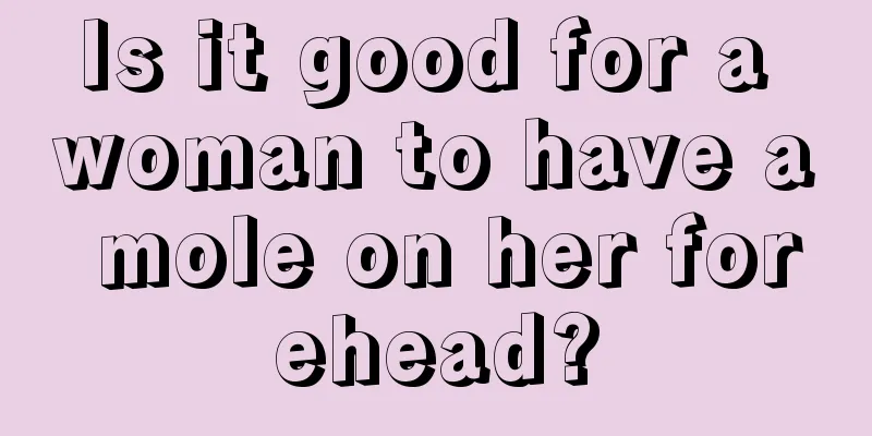 Is it good for a woman to have a mole on her forehead?