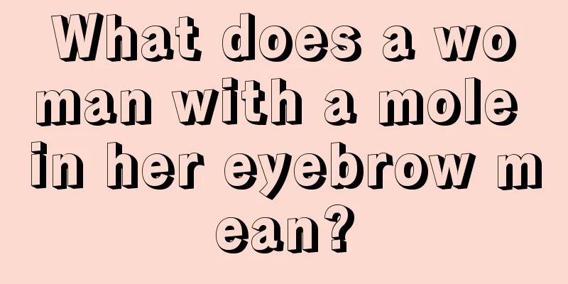 What does a woman with a mole in her eyebrow mean?