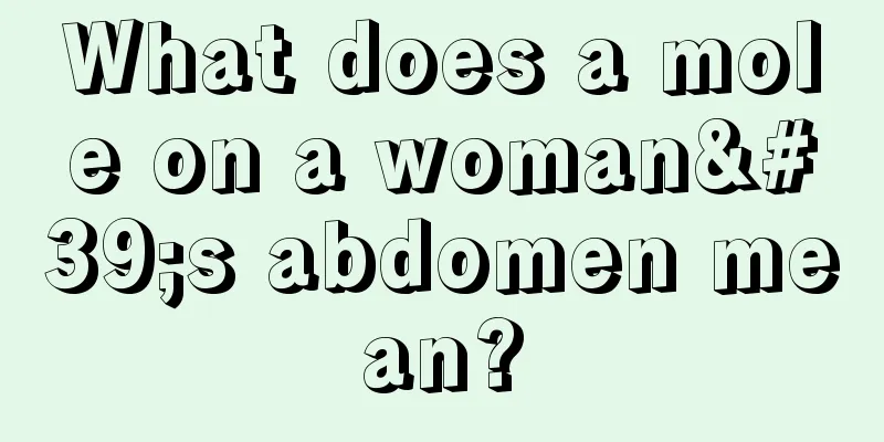 What does a mole on a woman's abdomen mean?