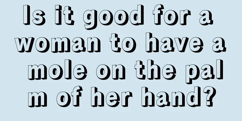 Is it good for a woman to have a mole on the palm of her hand?