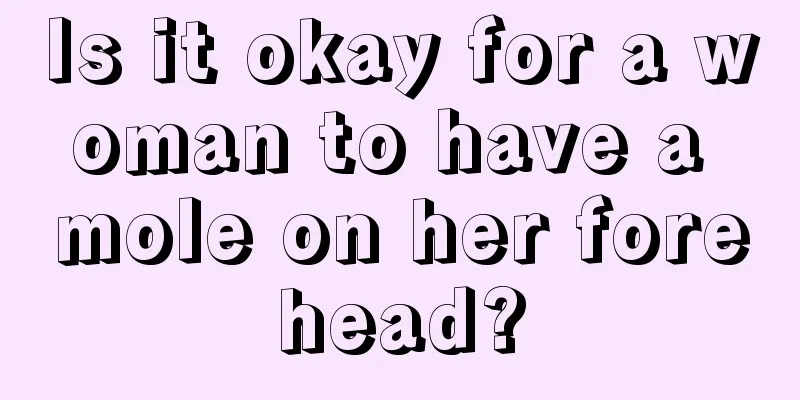 Is it okay for a woman to have a mole on her forehead?