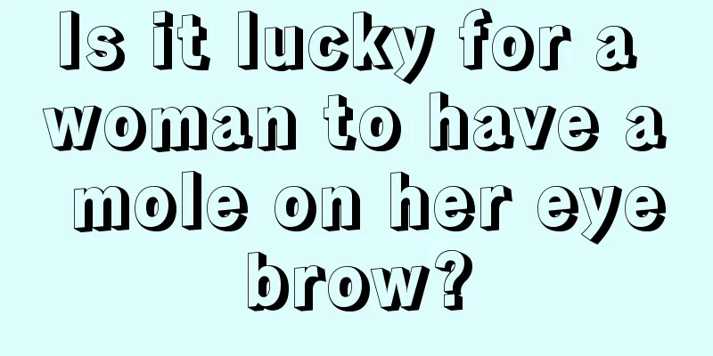 Is it lucky for a woman to have a mole on her eyebrow?