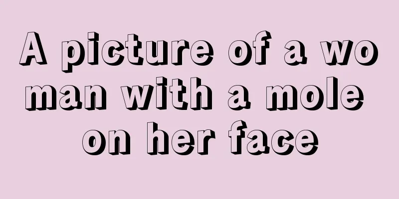 A picture of a woman with a mole on her face