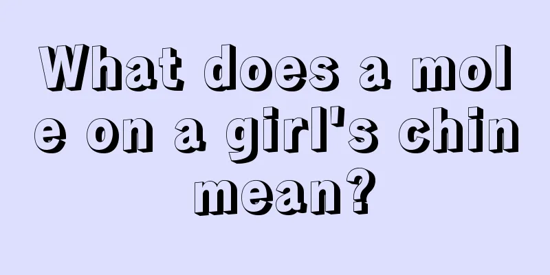 What does a mole on a girl's chin mean?