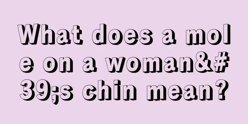 What does a mole on a woman's chin mean?