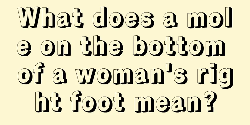 What does a mole on the bottom of a woman's right foot mean?
