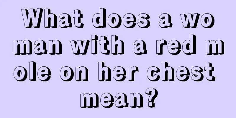 What does a woman with a red mole on her chest mean?
