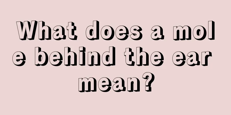 What does a mole behind the ear mean?