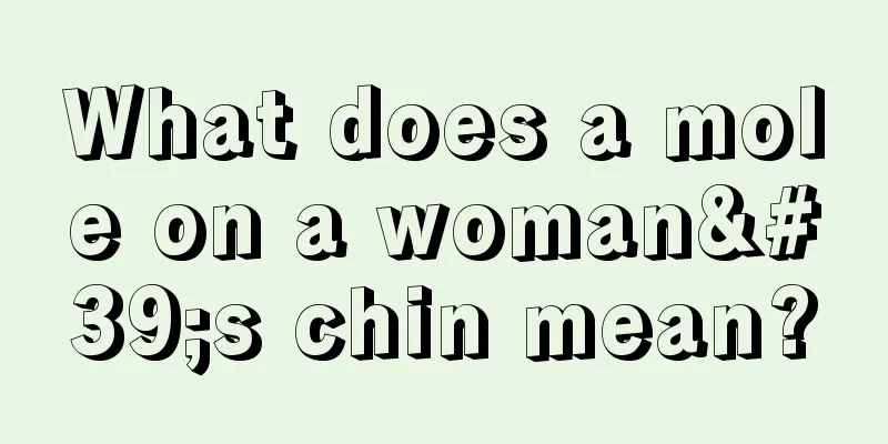 What does a mole on a woman's chin mean?