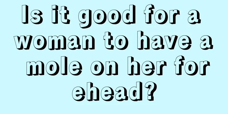 Is it good for a woman to have a mole on her forehead?