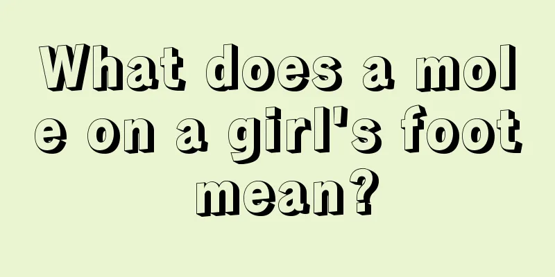 What does a mole on a girl's foot mean?