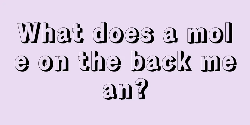 What does a mole on the back mean?