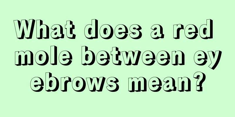 What does a red mole between eyebrows mean?