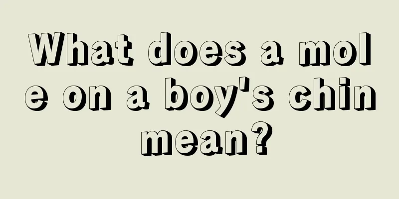 What does a mole on a boy's chin mean?