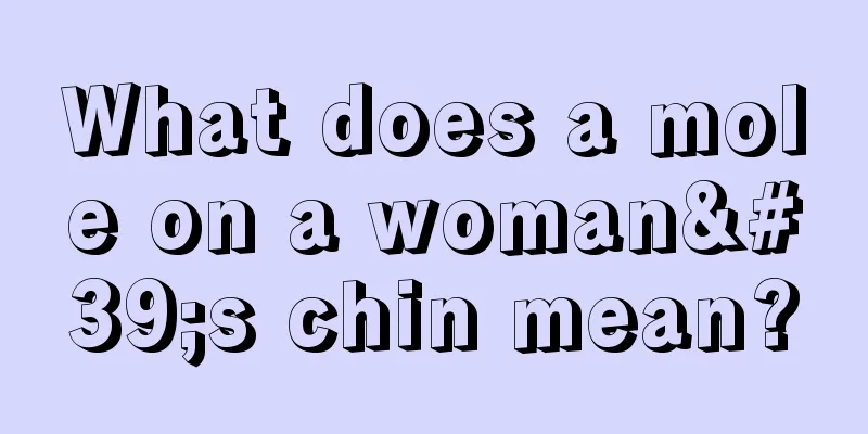 What does a mole on a woman's chin mean?