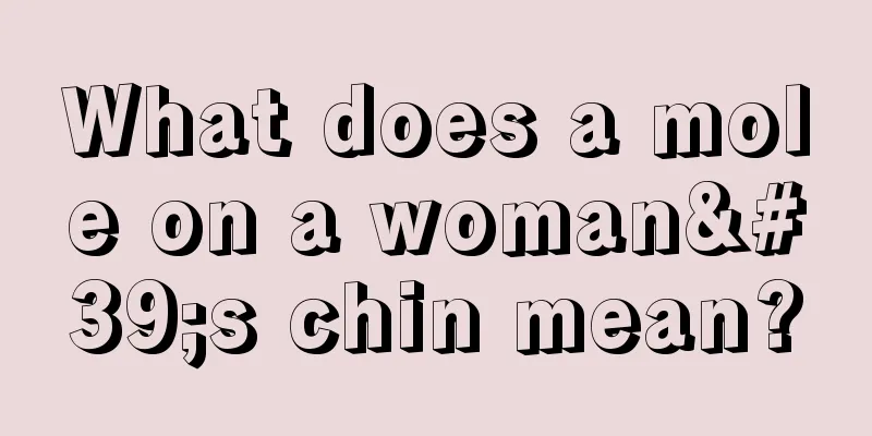 What does a mole on a woman's chin mean?