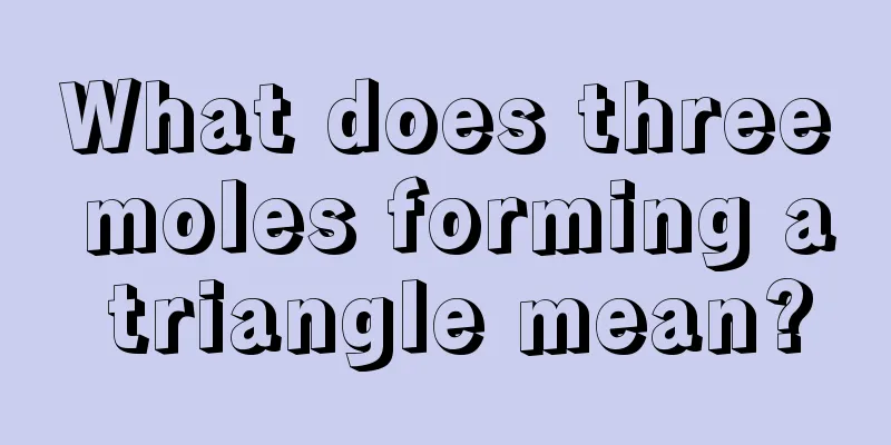 What does three moles forming a triangle mean?