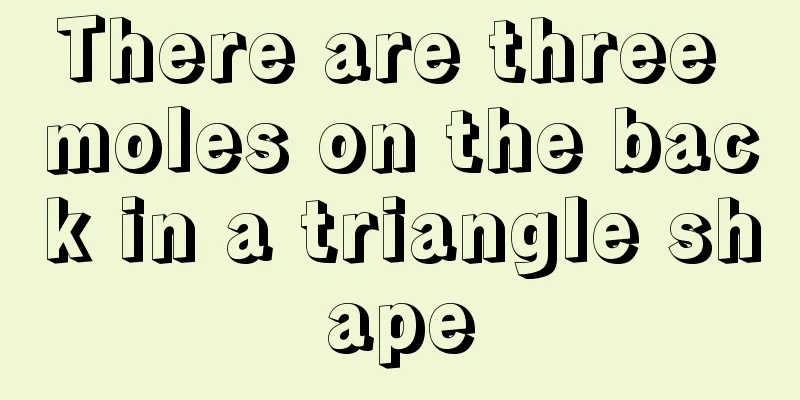 There are three moles on the back in a triangle shape