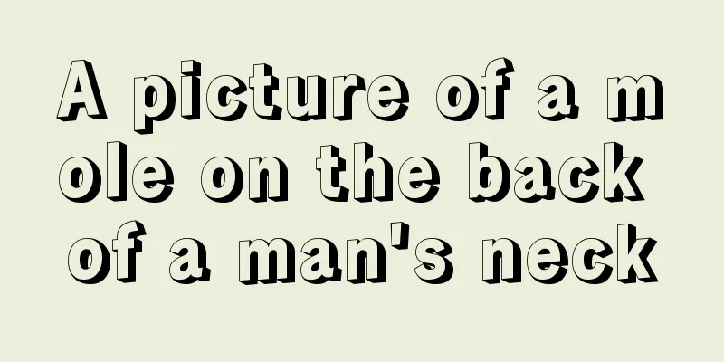 A picture of a mole on the back of a man's neck