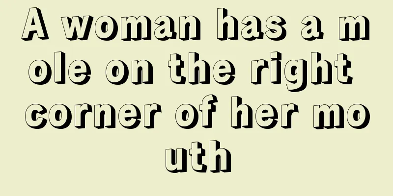 A woman has a mole on the right corner of her mouth