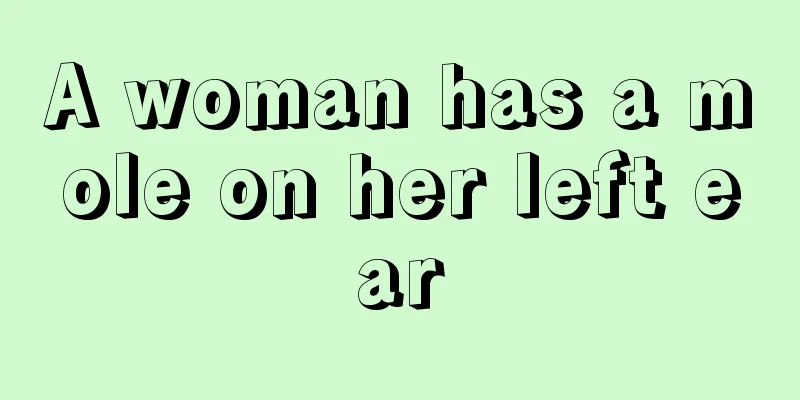 A woman has a mole on her left ear