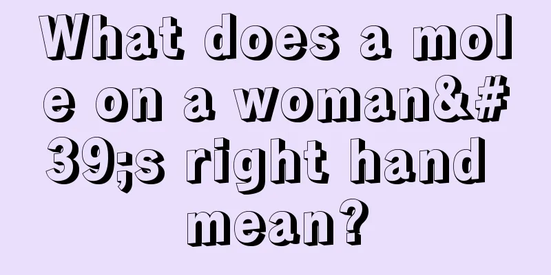 What does a mole on a woman's right hand mean?