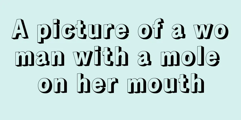 A picture of a woman with a mole on her mouth