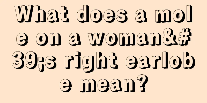 What does a mole on a woman's right earlobe mean?