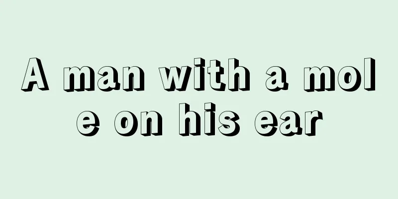 A man with a mole on his ear
