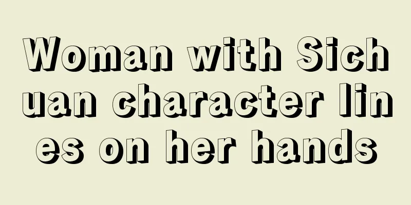 Woman with Sichuan character lines on her hands