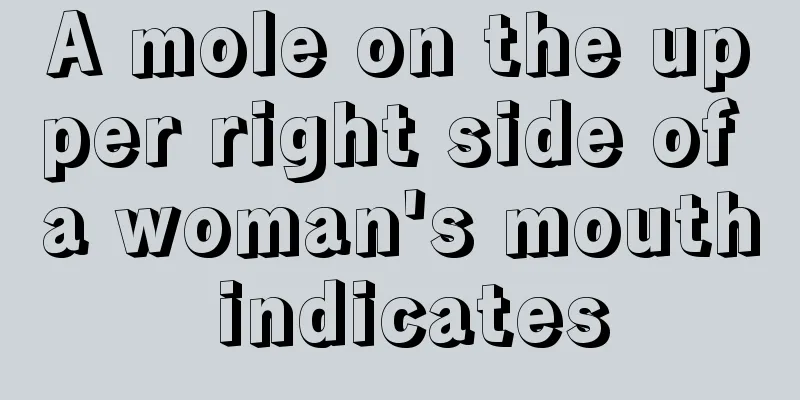 A mole on the upper right side of a woman's mouth indicates