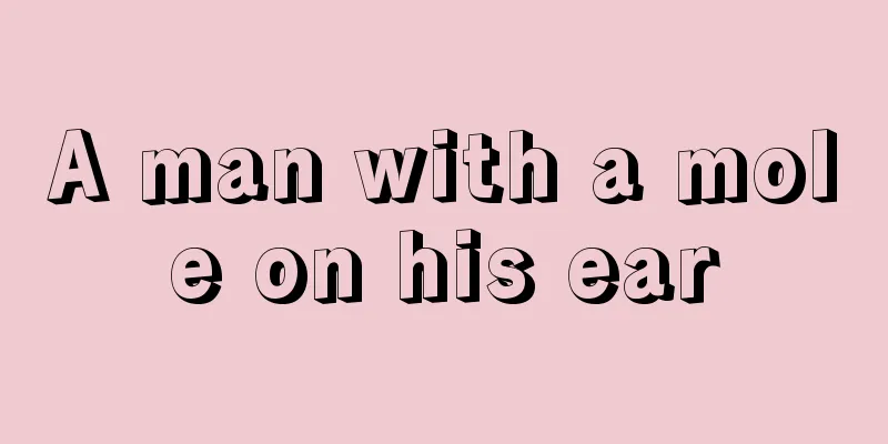 A man with a mole on his ear
