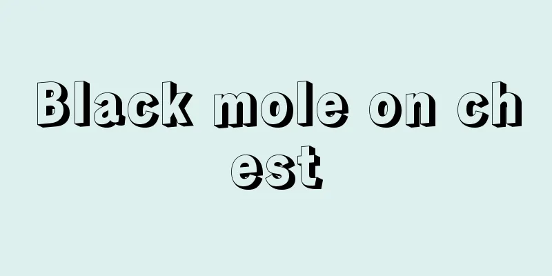Black mole on chest