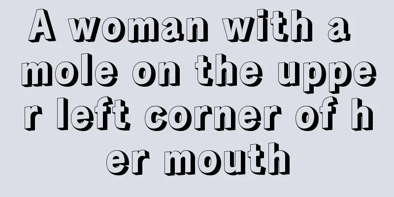 A woman with a mole on the upper left corner of her mouth