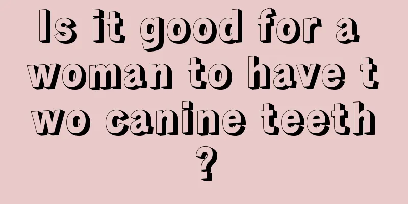Is it good for a woman to have two canine teeth?