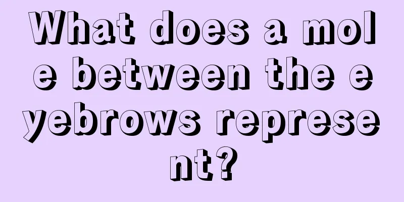 What does a mole between the eyebrows represent?