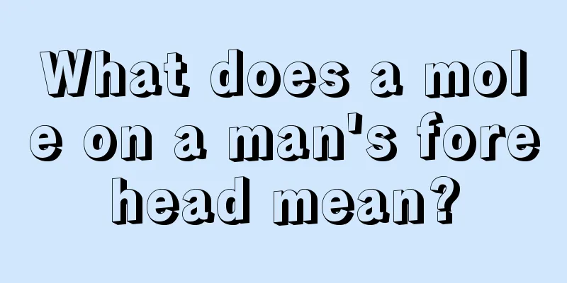 What does a mole on a man's forehead mean?
