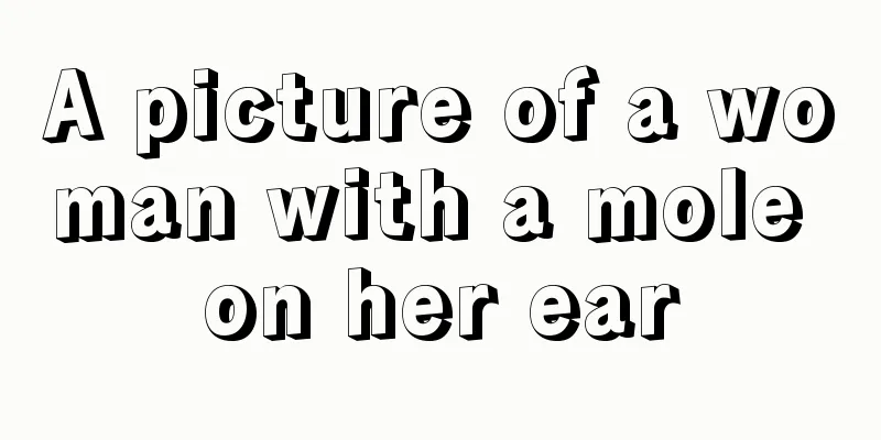 A picture of a woman with a mole on her ear